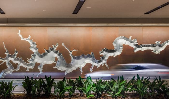ART WALL, FABRICATED IN SOLANUM STEEL AND ALUMINUM, AT THE HYATT REGENCY HOTEL IN HOUSTON.