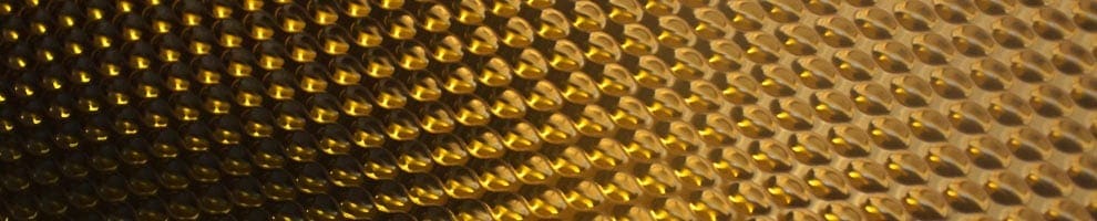 GOLD LIGHT INTERFERENCE-COATED STAINLESS STEEL WITH BUMPED SURFACE.