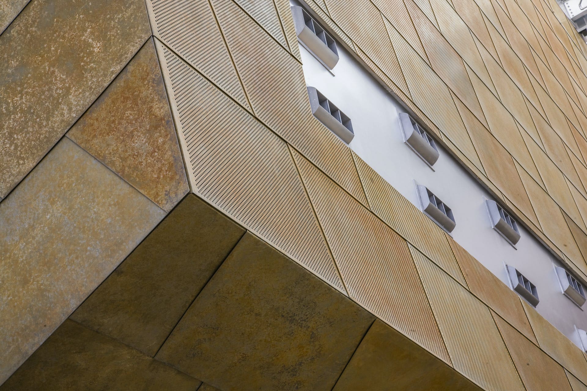 CUSTOM PERFORATED TRAPEZOIDAL PANEL SYSTEM FOR THE TAUBMAN MUSEUM OF ART.