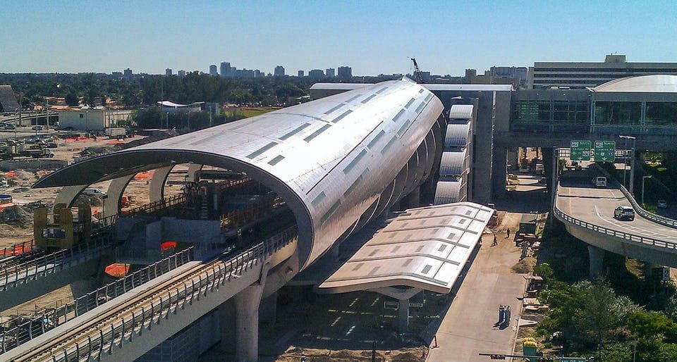 CUSTOM GLASS AND STAINLESS STEEL ROOF AND STRUCTURE FOR MIAMI INTERMODAL CENTER.