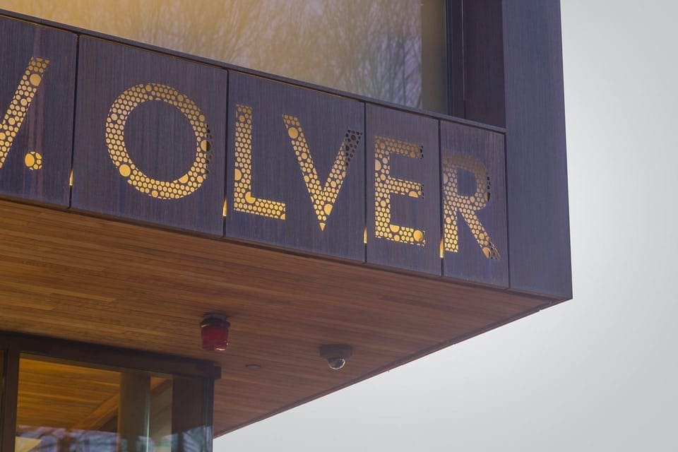 CUSTOM PERFORATED SIGNAGE FOR JOHN OLVER TRANSIT CENTER