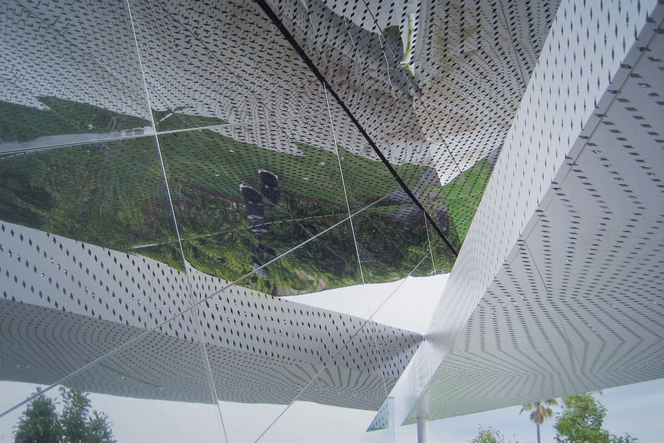 PERFORATIONS CONTINUE AROUND CORNERS AND ACROSS PANELS SEAMS.