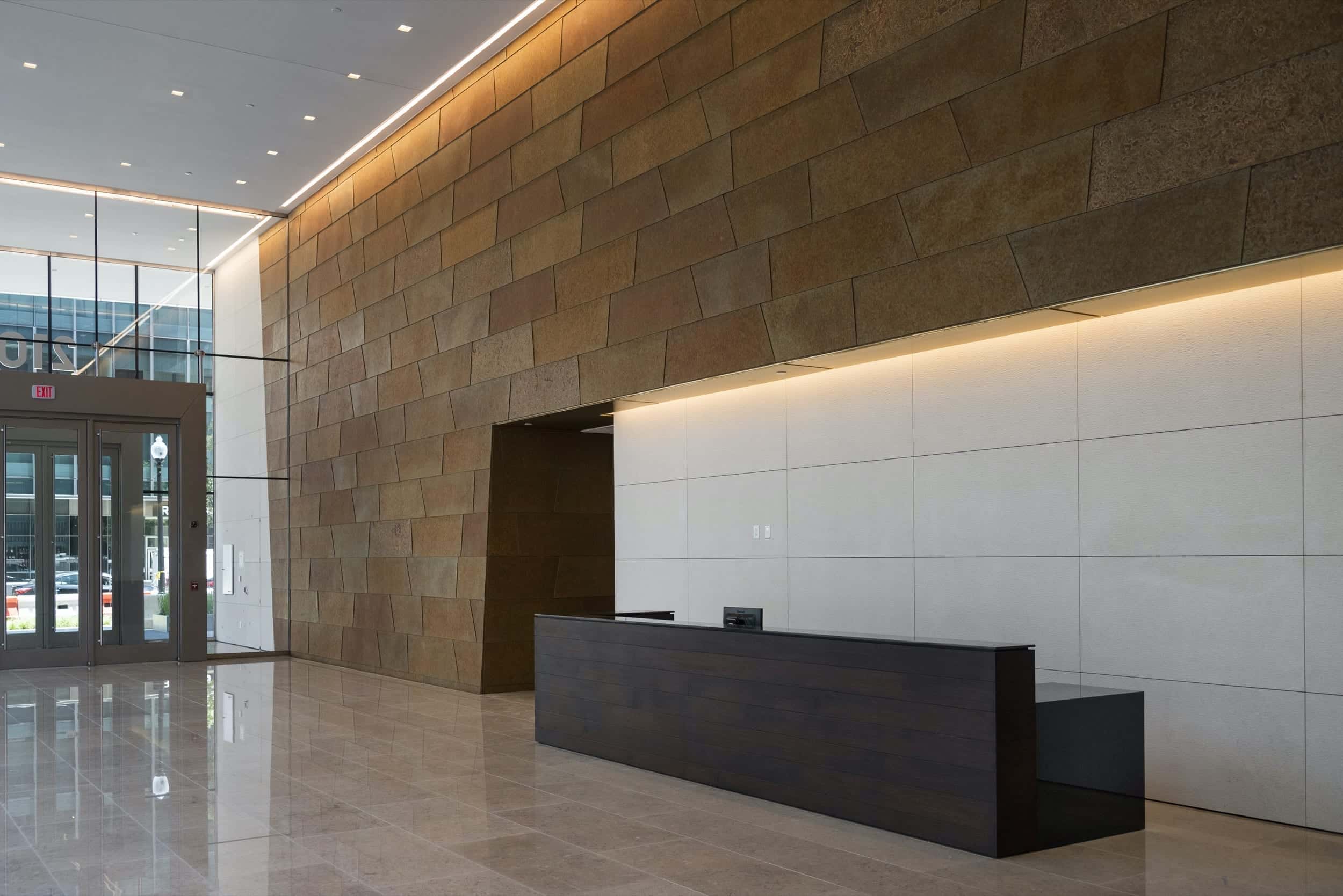 Interior lobby cladded with Roano zinc panels.