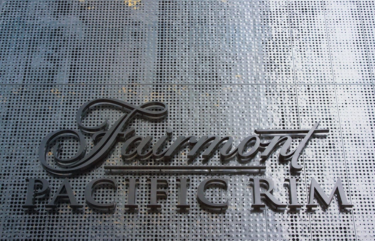 Detail of the Fairmont Pacific Rim perforated panels and signage.