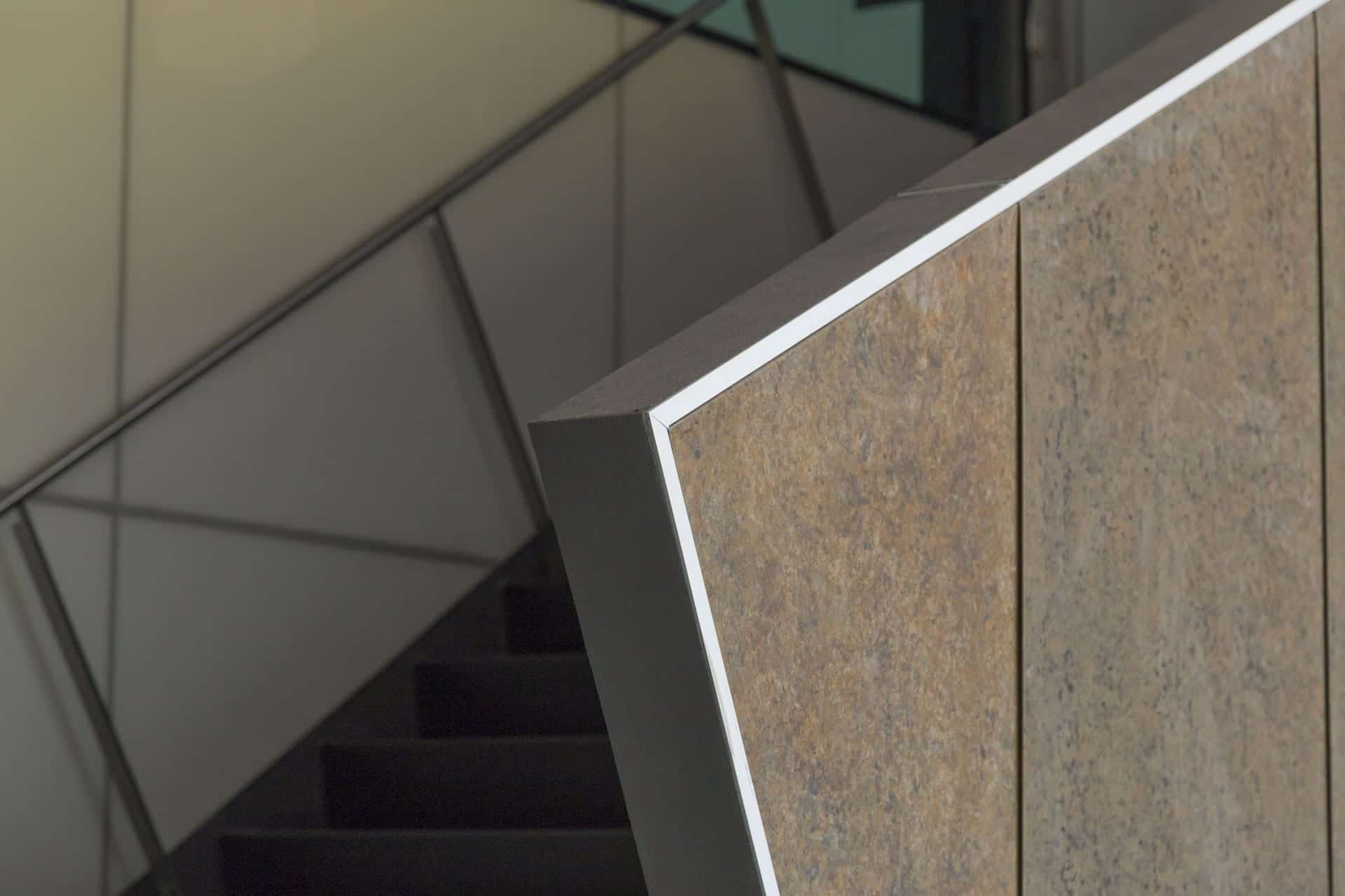 Detail of the custom zinc interior atrium staircase at the McMurtry Building in Stanford, California.