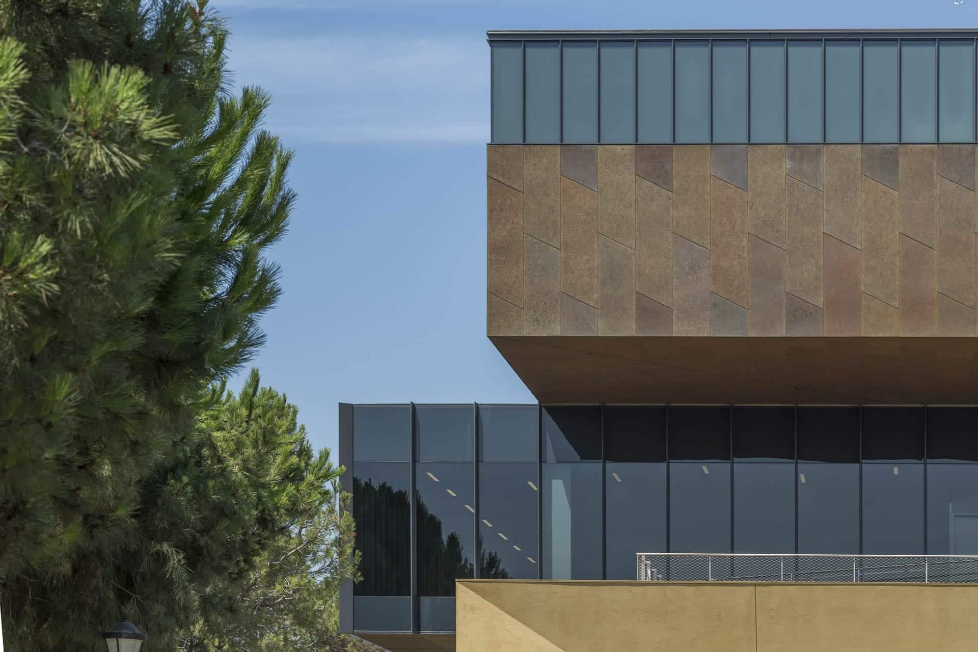 Detail of the cantilevered facade with custom-patinated zinc metalwork, on the McMurtry Building in Stanford, California.