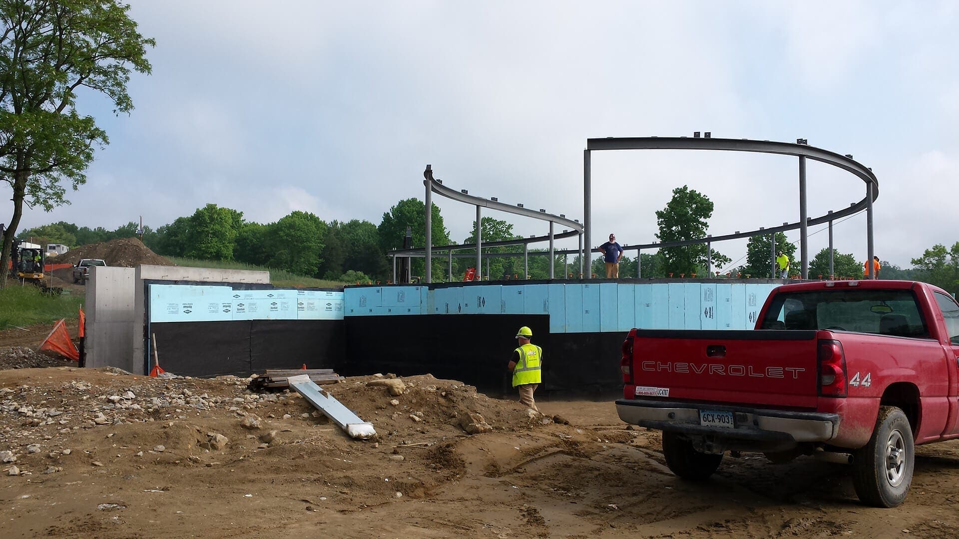 Installers place the structural steel supports for the Grace Farms roof.