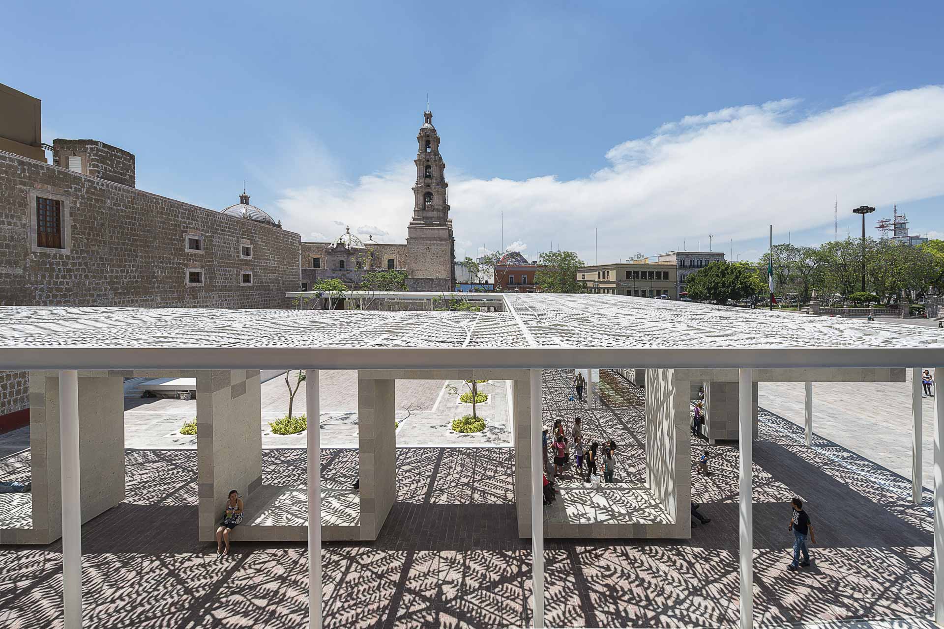 Perforated metal canopy casts shadows at Aguascalientes, Mexico.