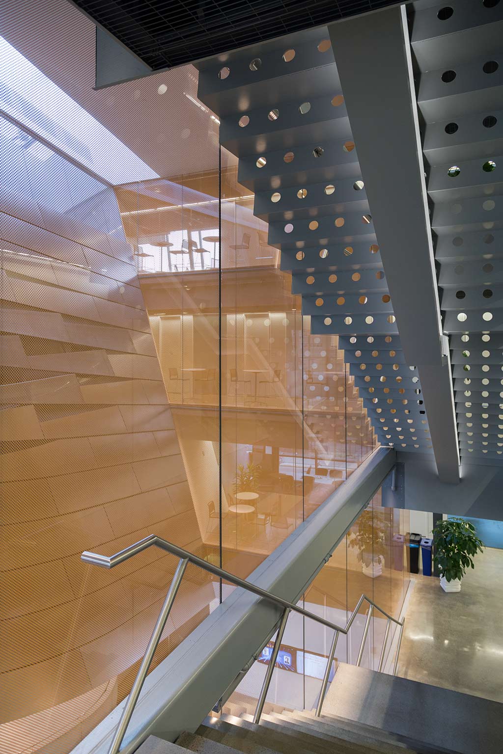 Atrium at Gates Hall, shows the interior feature wall installed and fabricated by Zahner.