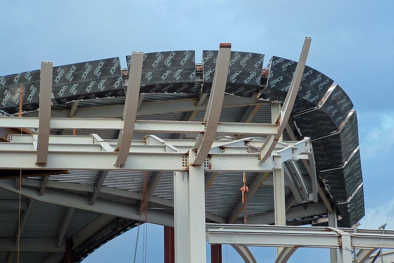 View of the exposed beams which will soon form the upward-curving awning.
