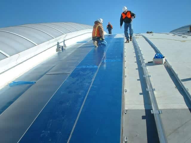 Zahner field installation crew during construction of the Inverted Seam roof system.