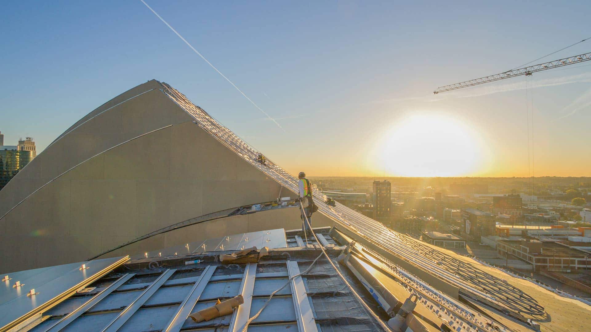 Zahner installers set panels at Kauffman Center. Zahner installers set panels at Kauffman Center.