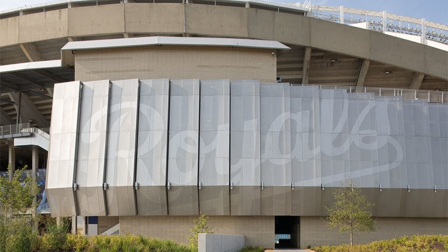 KAUFFMAN STADIUM FACADE WITH PERFORATED “ROYALS” LOGO EMBLAZONED ON ITS WALL.