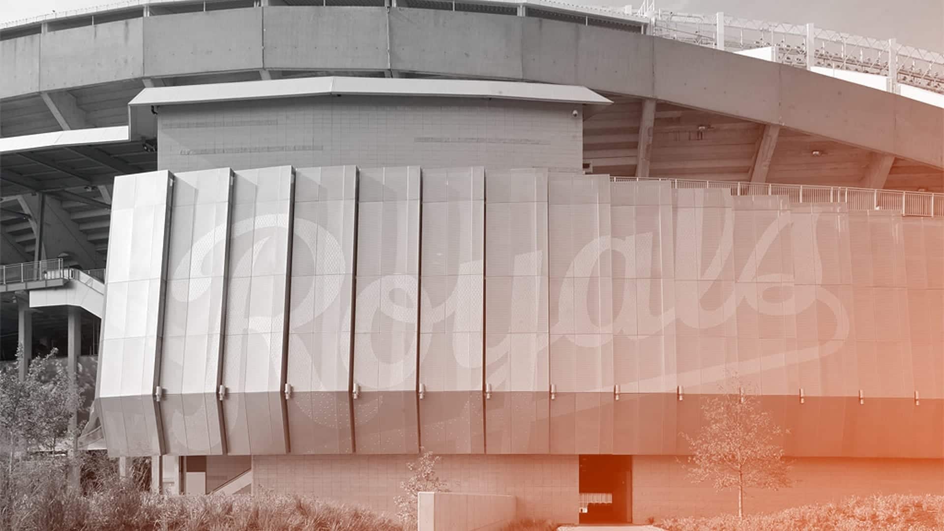 KAUFFMAN STADIUM FACADE WITH PERFORATED “ROYALS” LOGO EMBLAZONED ON ITS WALL.
