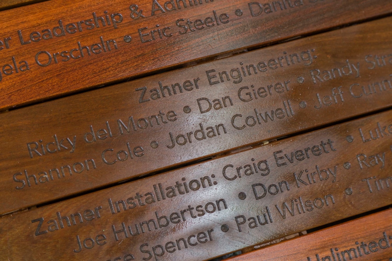 Engraved design and construction credits at The Chrysalis in Columbia, Maryland.