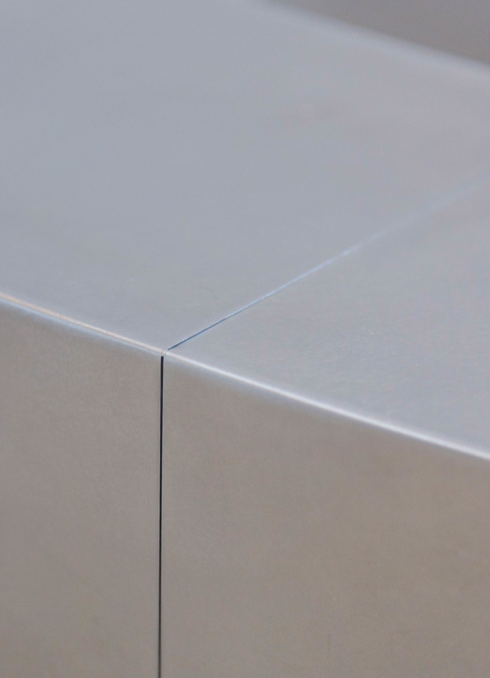 Detail of the stainless steel reception desk for the Nerman Museum of Contemporary Art