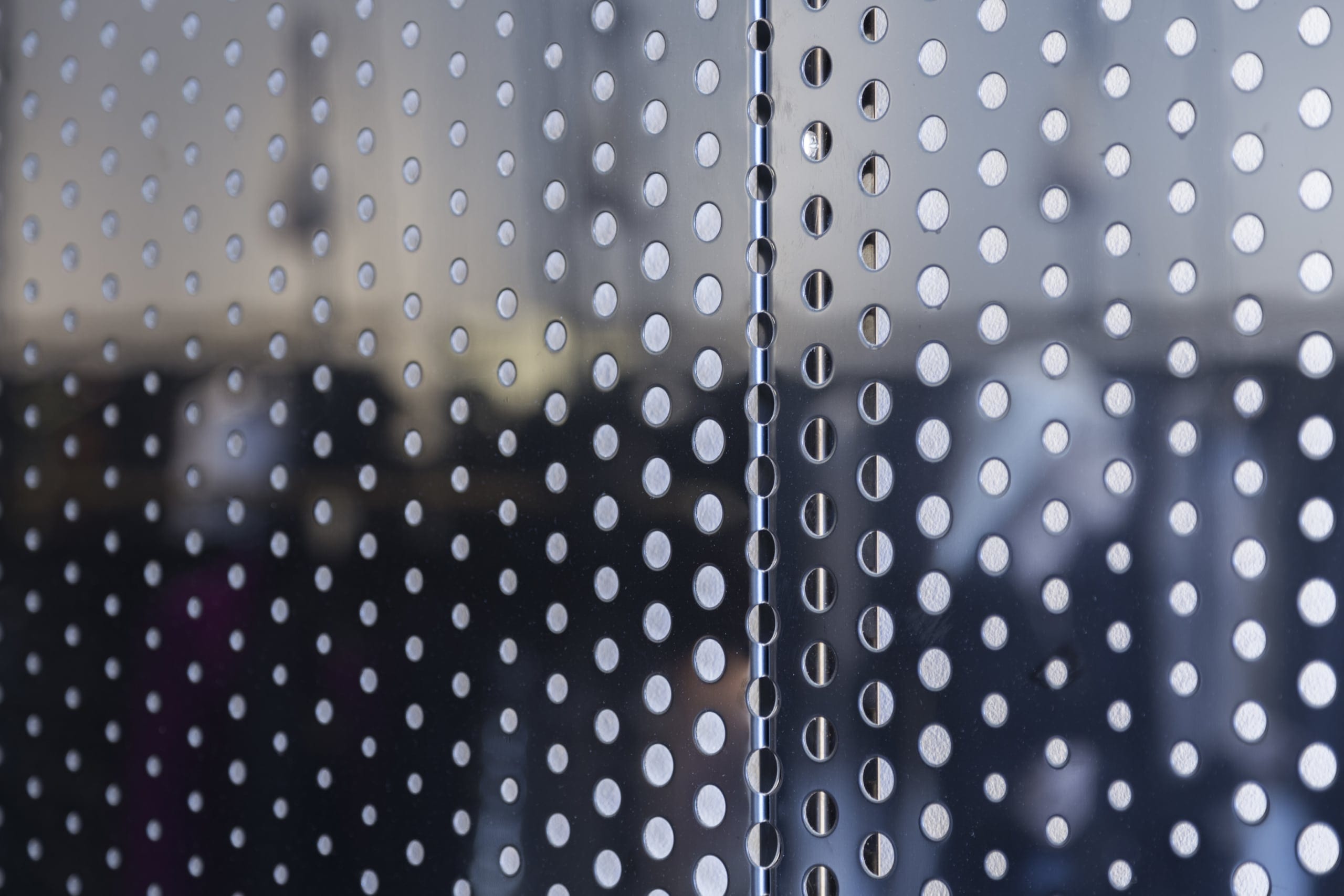 Detail of the interior screen wall with cross-seam perforation.