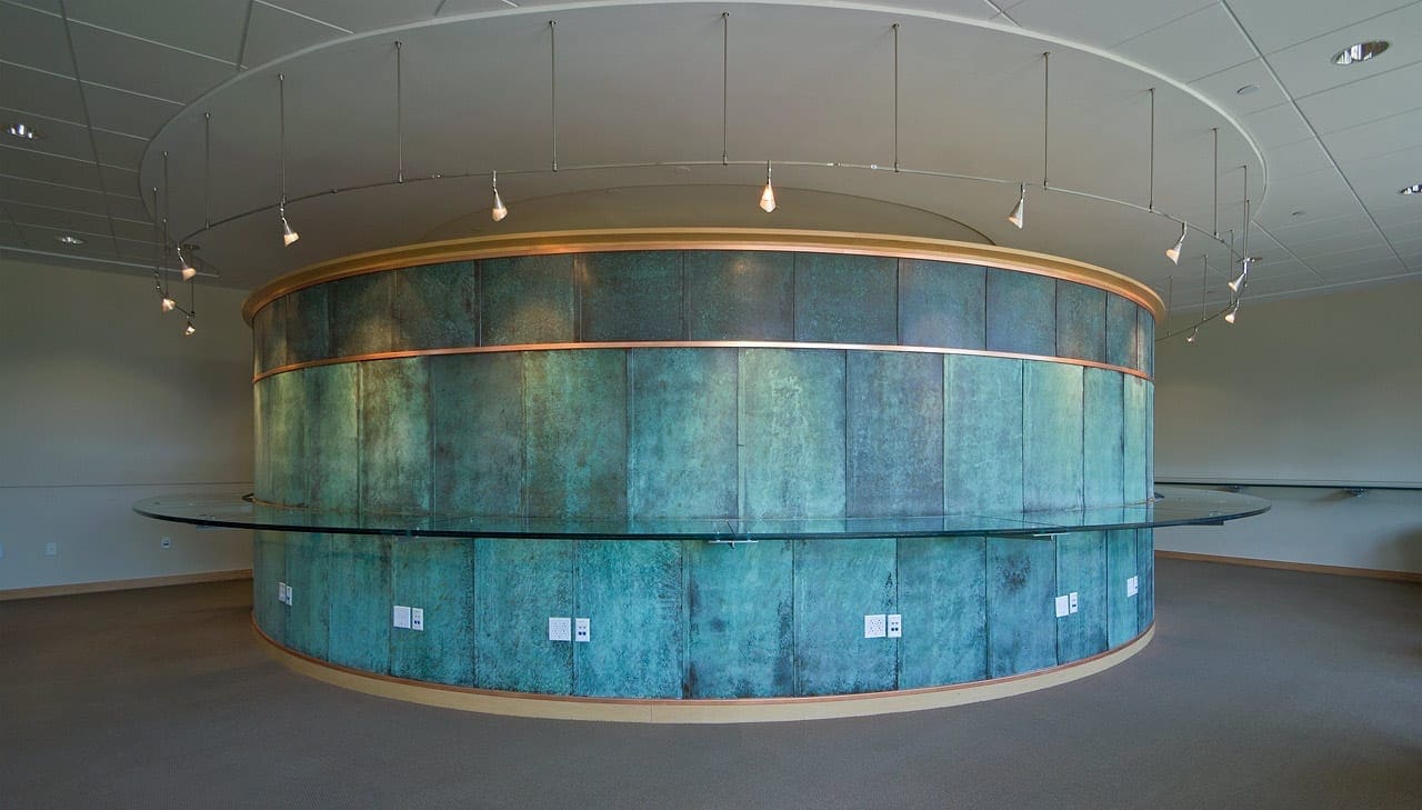 Custom copper patina on interior metal panels at the SMU Collins study room.