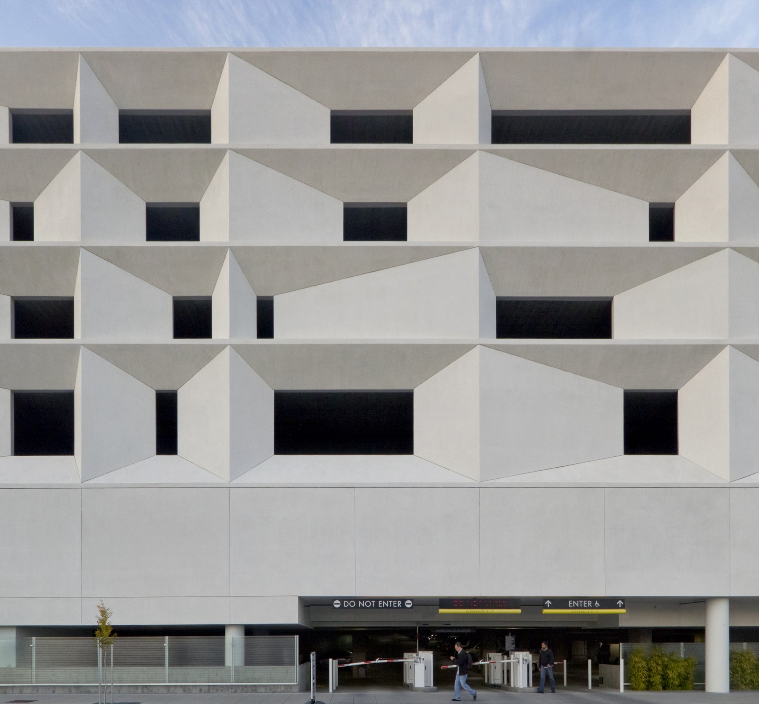 The northwest and south sides of the parking structure feature an intriguing stucco facade. 