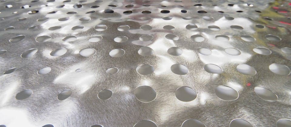 PERFORATED AND BUMP-EMBOSSED METAL PANELS BY ZAHNER.