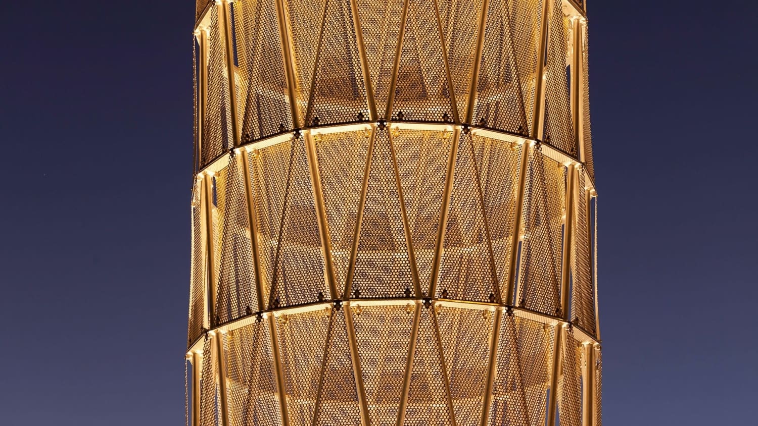 Perforated panels on Hope Tower at UNMC at dusk.
