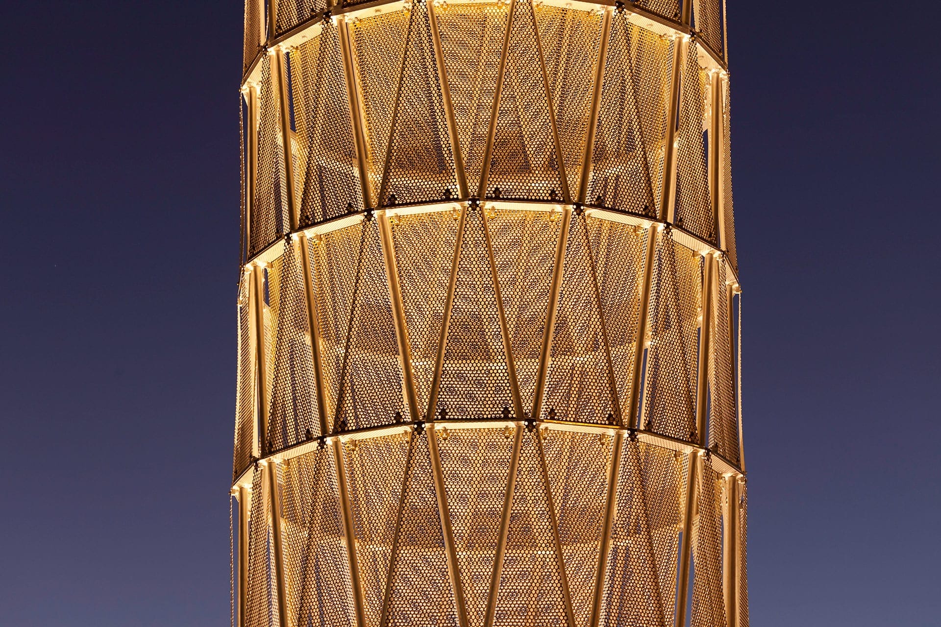 Perforated panels on Hope Tower at UNMC at dusk.