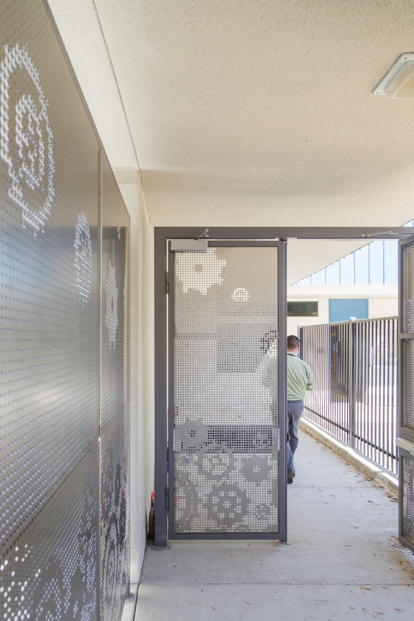 Perforated stainless steel doors at Washington Elementary.