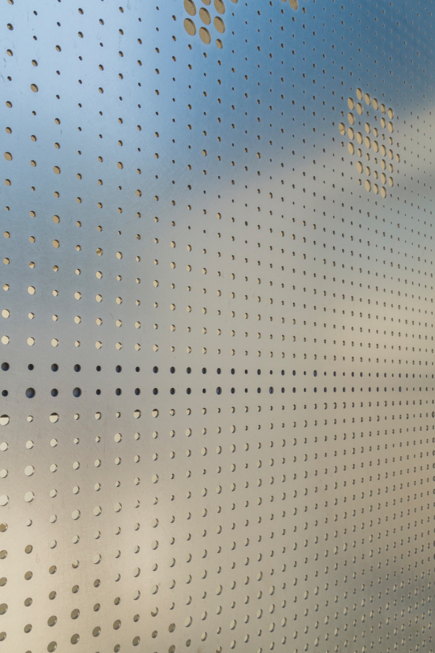 Detail of perforated stainless with Angel Hair finish at Washington Elementary.