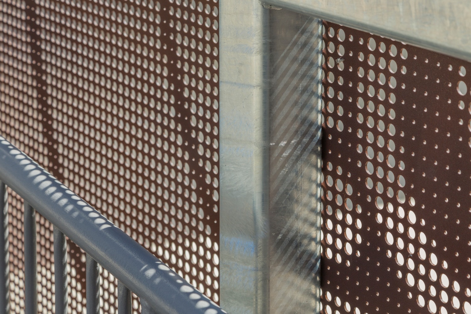 The contractor attached Zahner perforated panels to a galvanized steel structure.