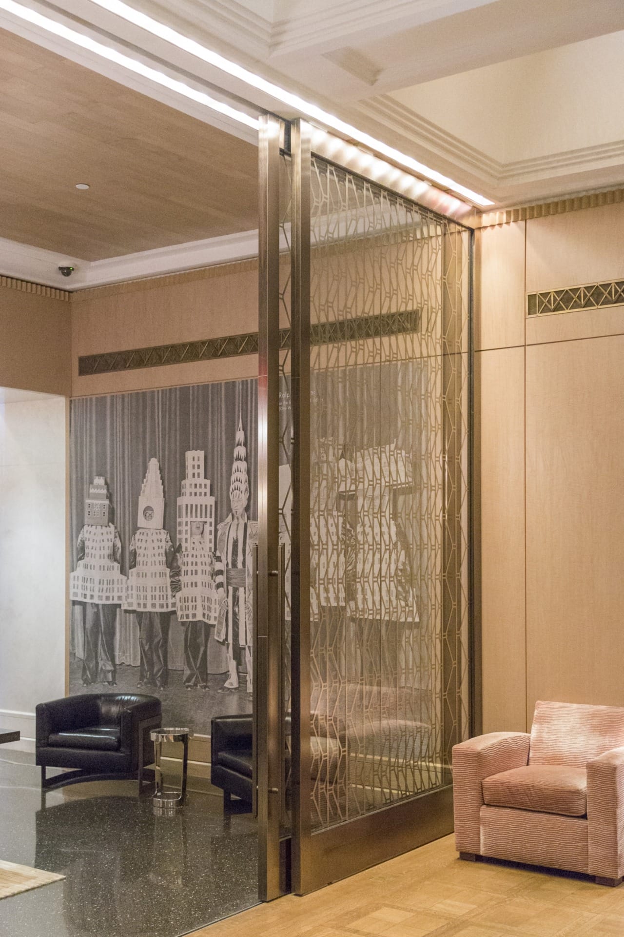 Interior sliding bronze doors. INTERIOR SLIDING BRONZE DOORS.