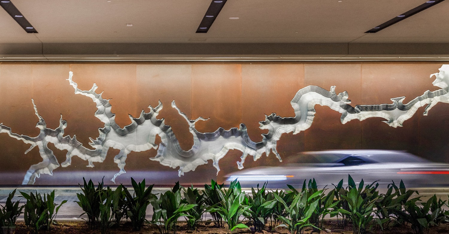 Art wall, fabricated in Solanum Steel and aluminum, at the Hyatt Regency Hotel in Houston.