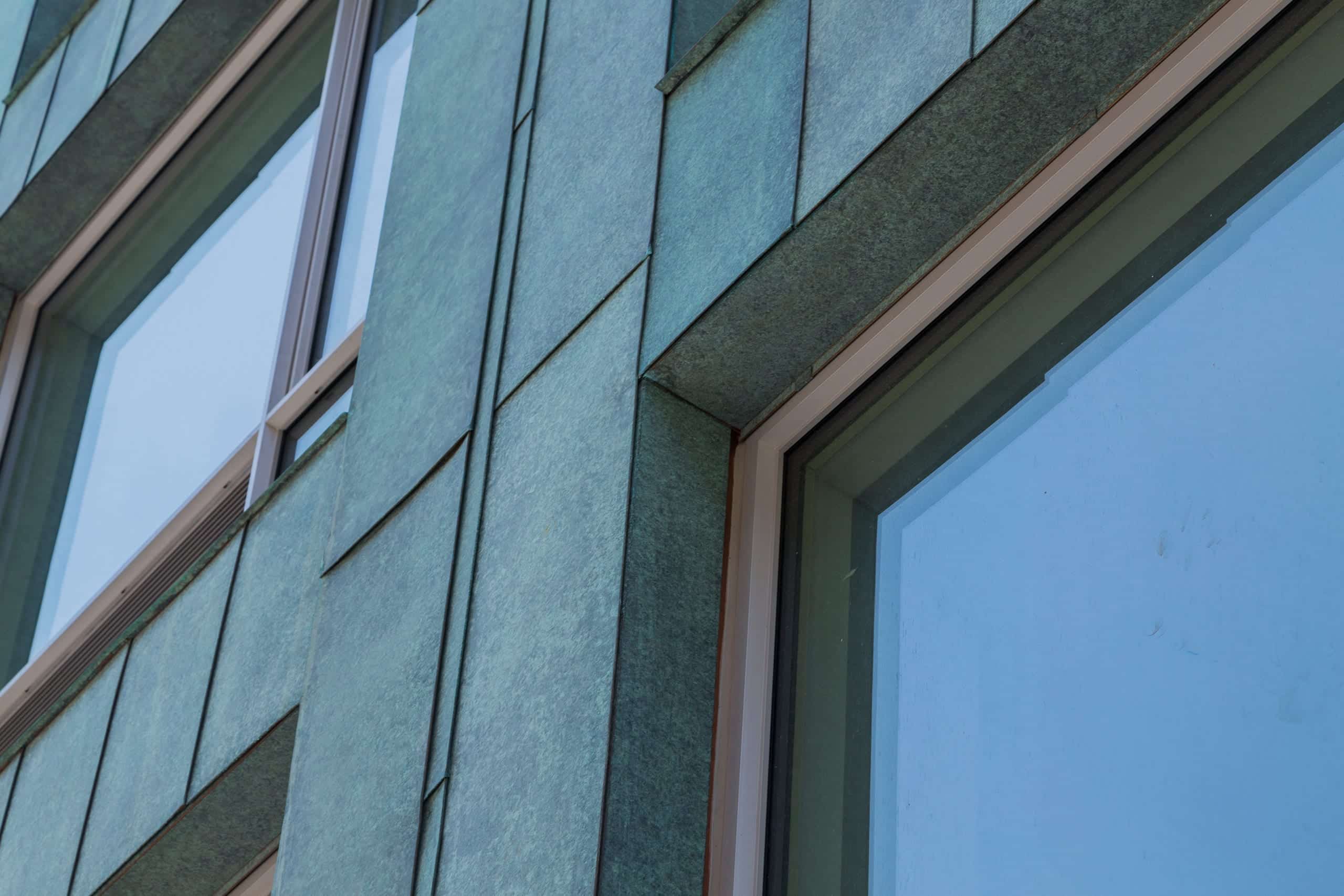 Detail of the custom facade for 178 North Eleventh with antique copper patina in Brooklyn, New York. 