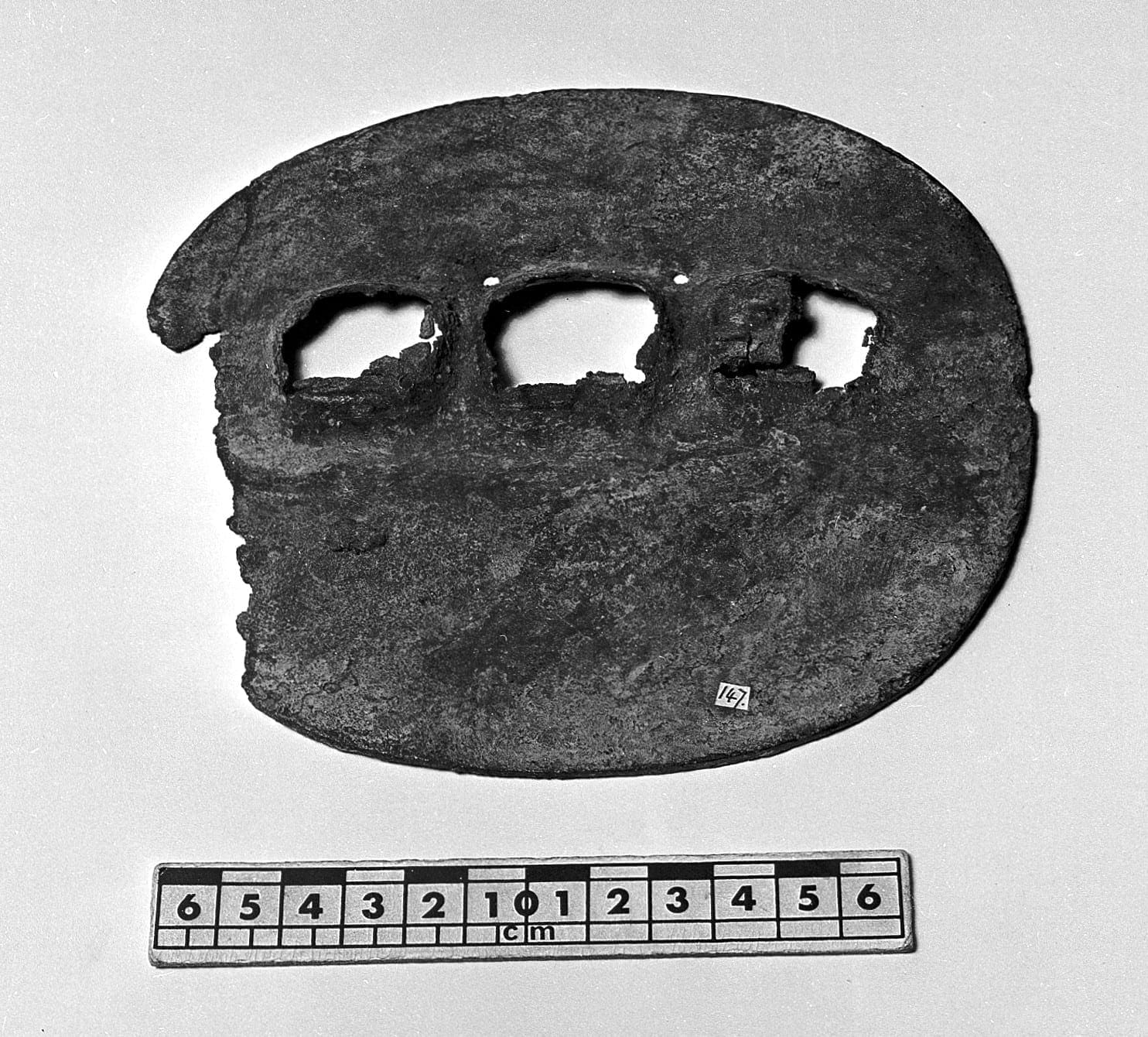 Ecuadorian metal object with three holes, from Huigra