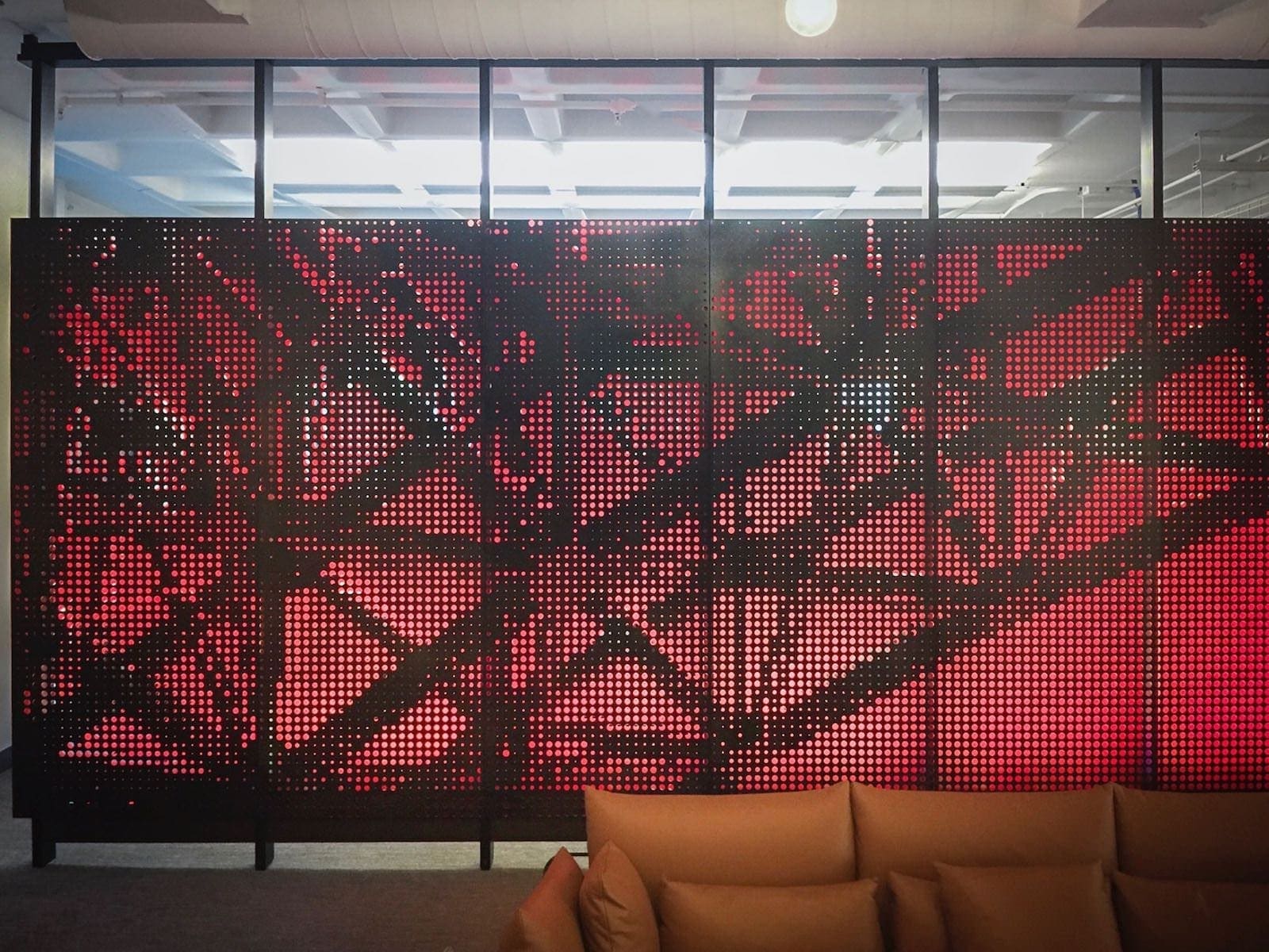 Screens and wall panels in painted aluminum for the Twitter corporate office in San Francisco.