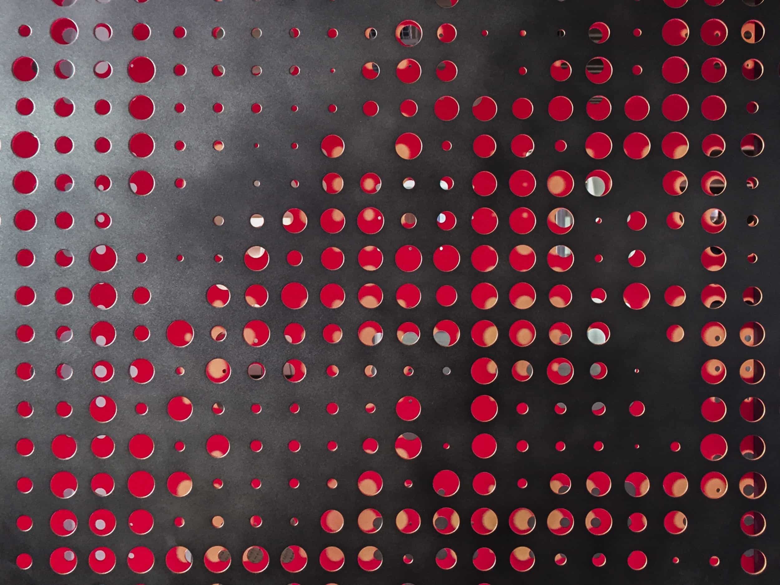 twitter-headquarters-perf-metal-1836 Screens and wall panels in painted aluminum for the Twitter corporate office in San Francisco.