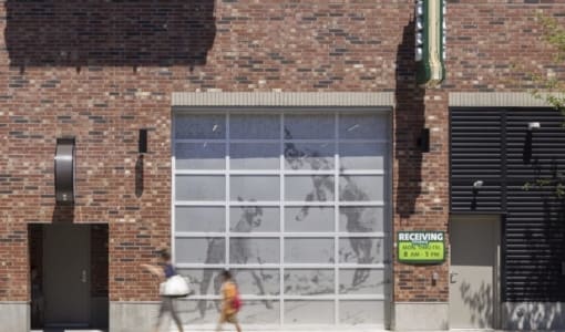 Exterior view of ImageWall applied to hinged garage door.