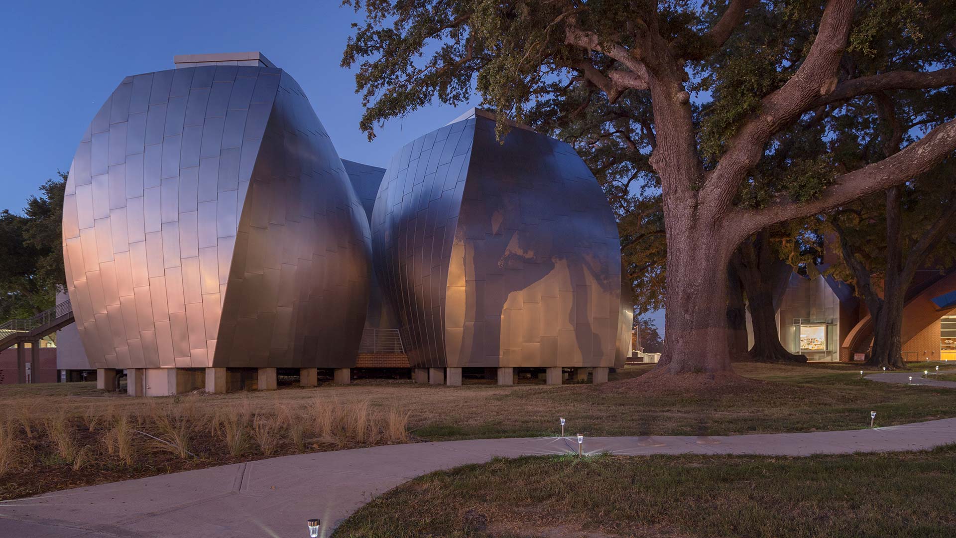 Ohr-O'Keefe Museum of Art at dusk, designed by Frank Gehry Partners.