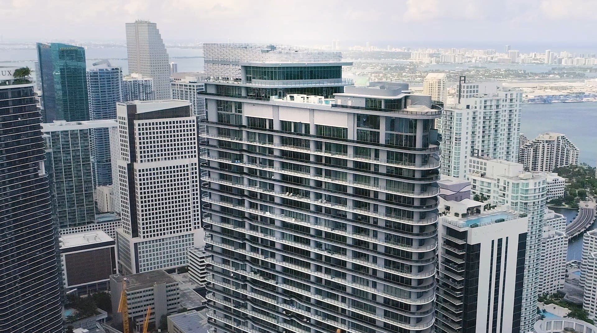 Penthouse facade on top of Brickell Flatiron fabricated by Zahner.