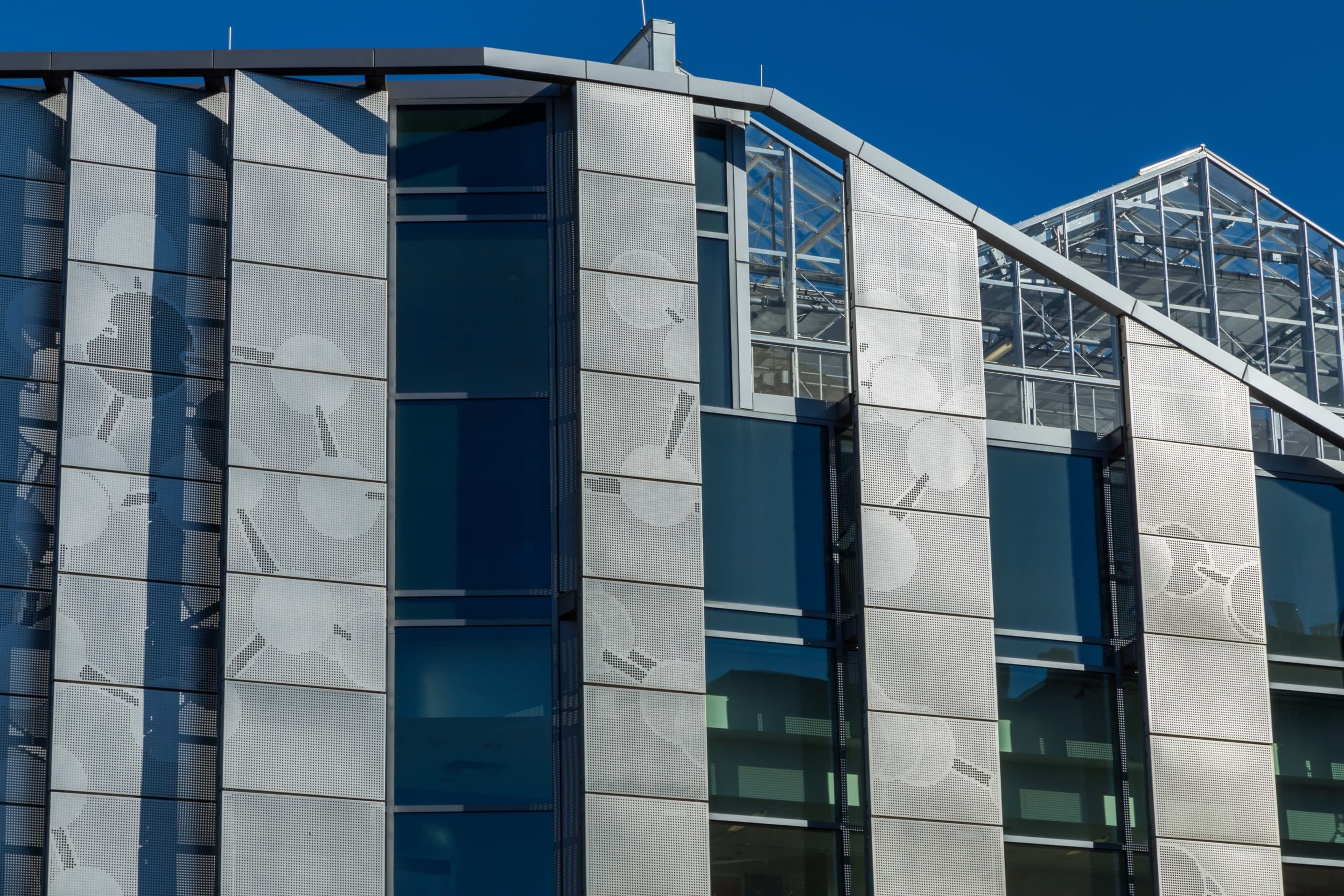 George Mason University's Science and Technology building features a custom perforated facade, created using Zahner ImageWall technology.