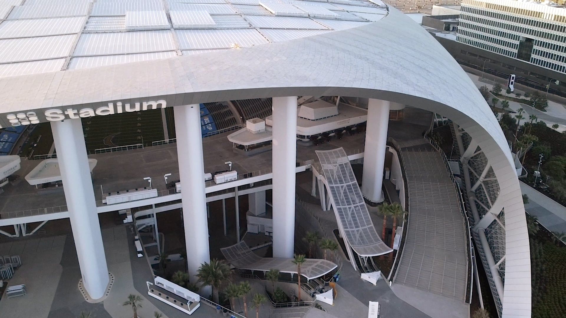 Drone view of the Frost White anodized aluminum front soffit of SoFi Stadium.