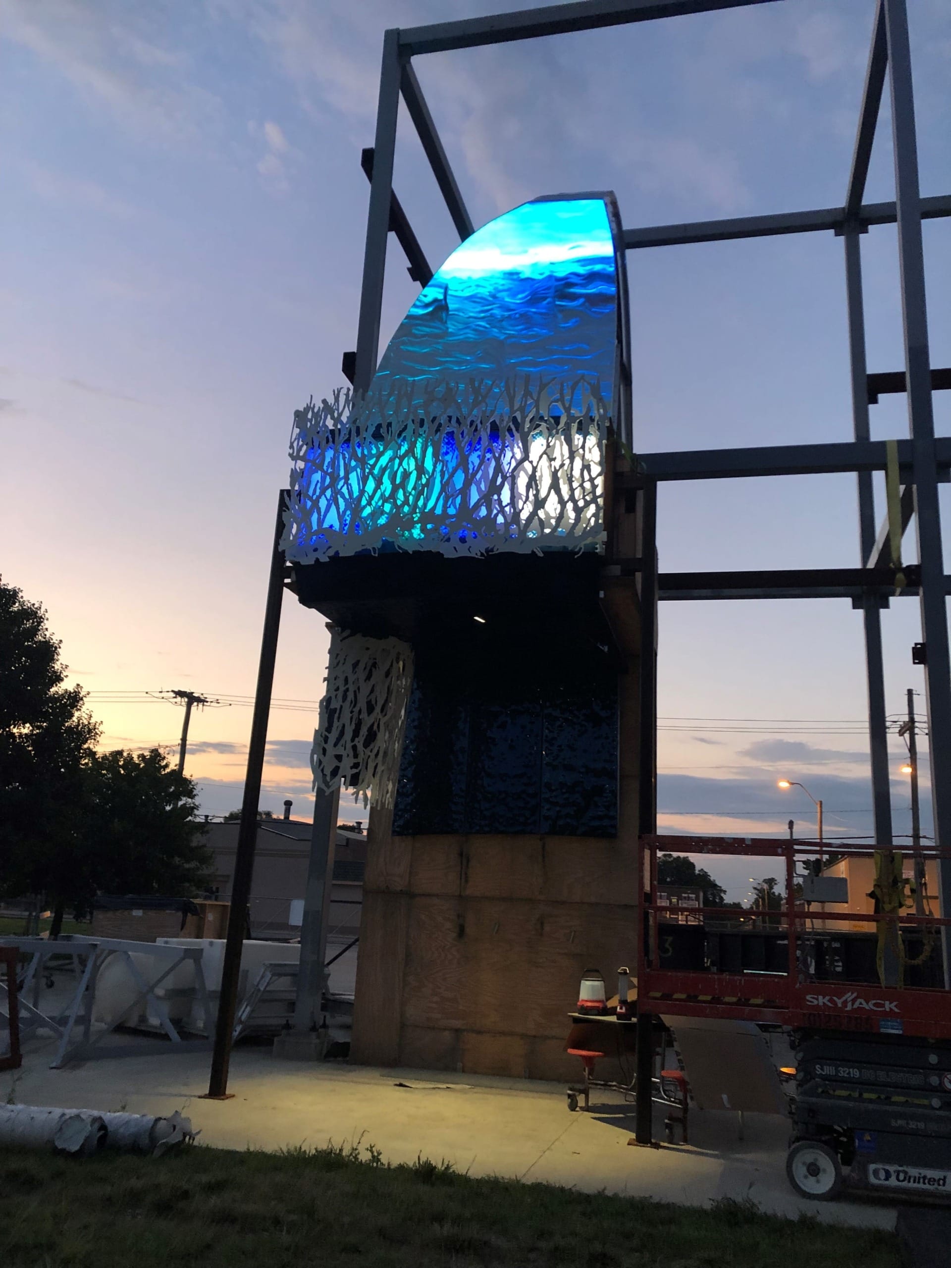 Night viewing of the mockup for the Suzanne and Walter Scott Aquarium facade.