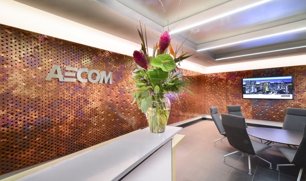An ImageWall feature wall, built with Zahner's Dirty Penny™ copper, makes a bold statement in the lobby of AECOM's Cleveland office.