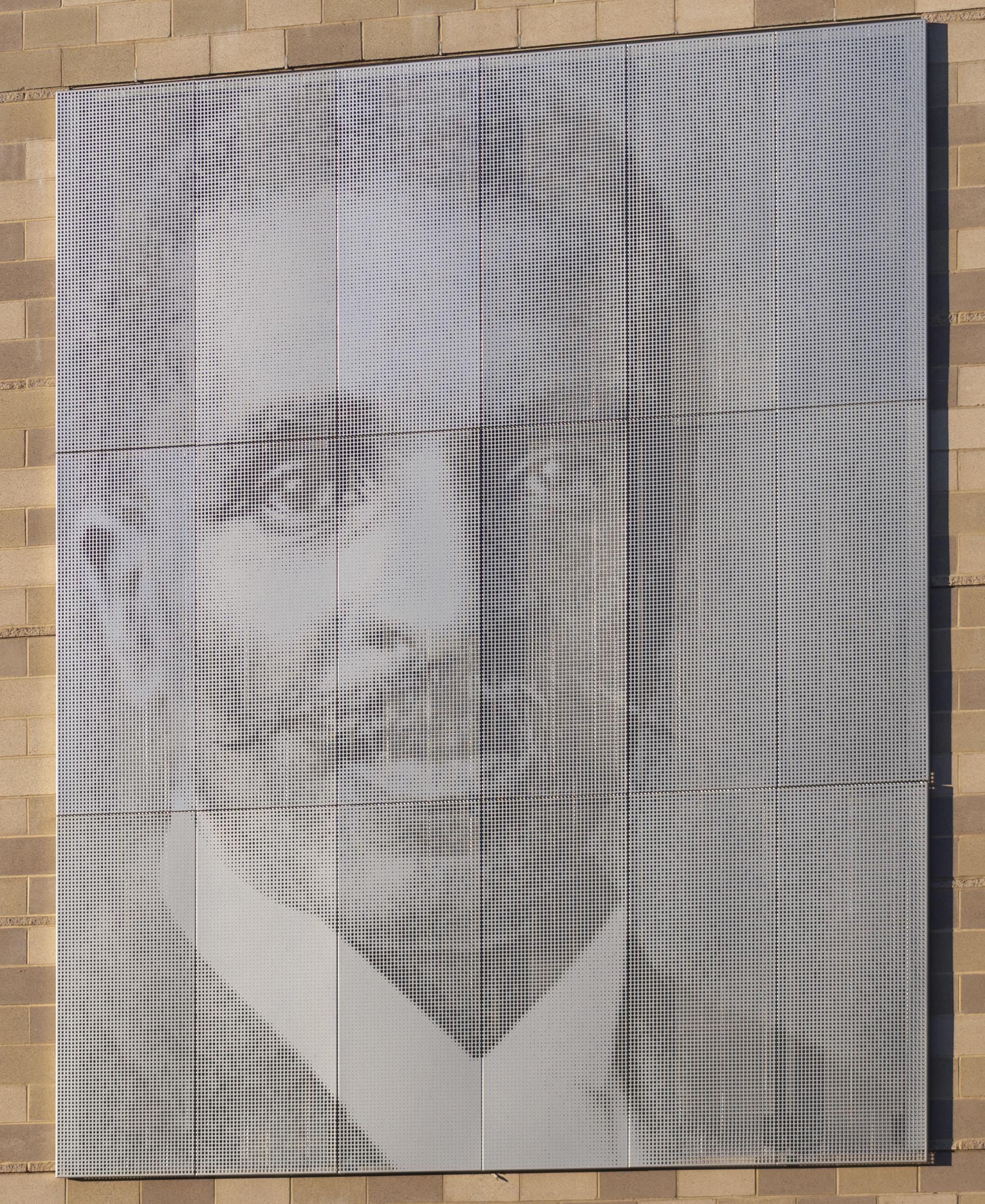 Installed perforated metal panel mural with Cross-Seam Perf at Carver Elementary.