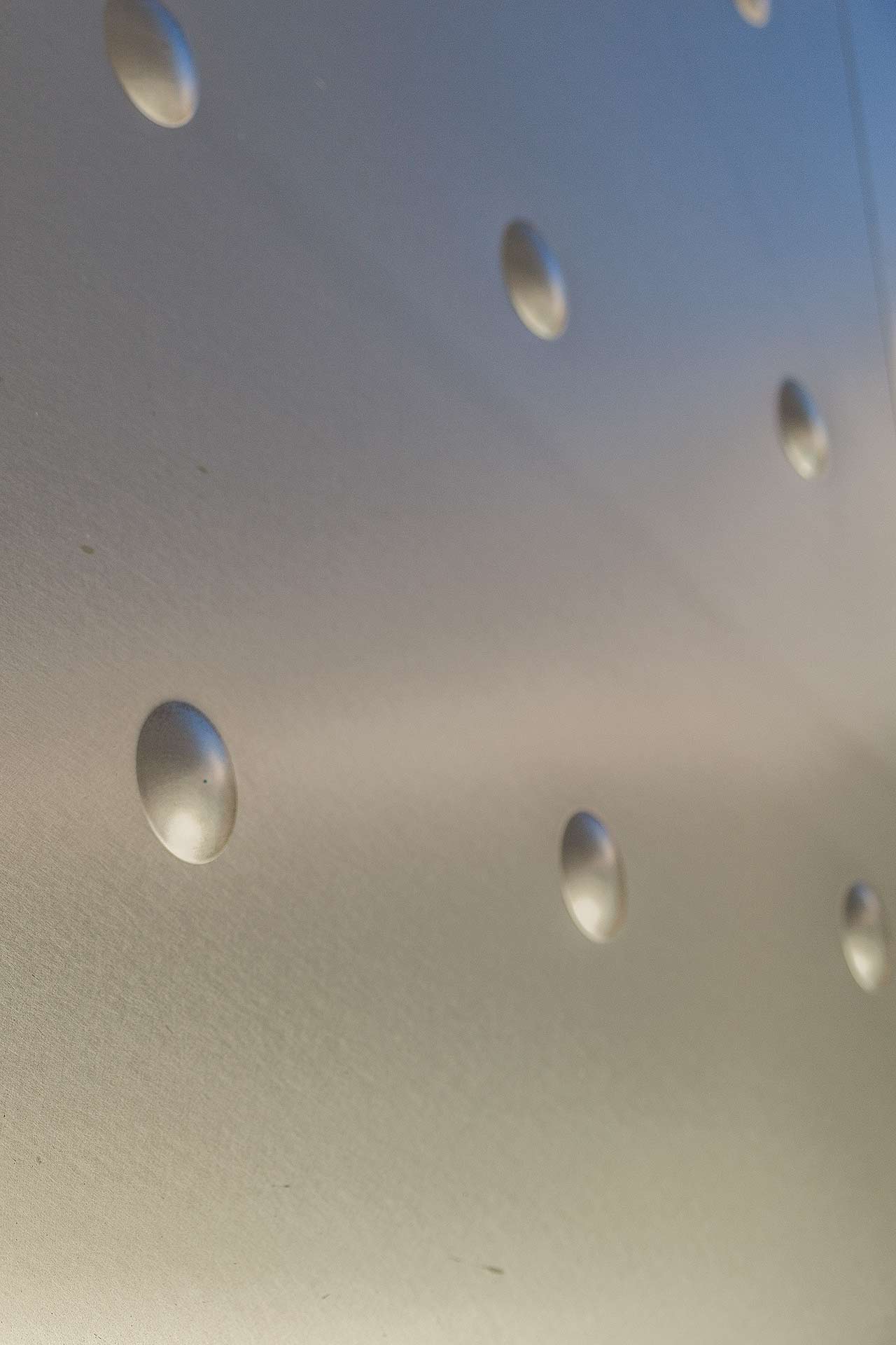 closeup of the CUSTOM DIMPLED STAINLESS STEEL.