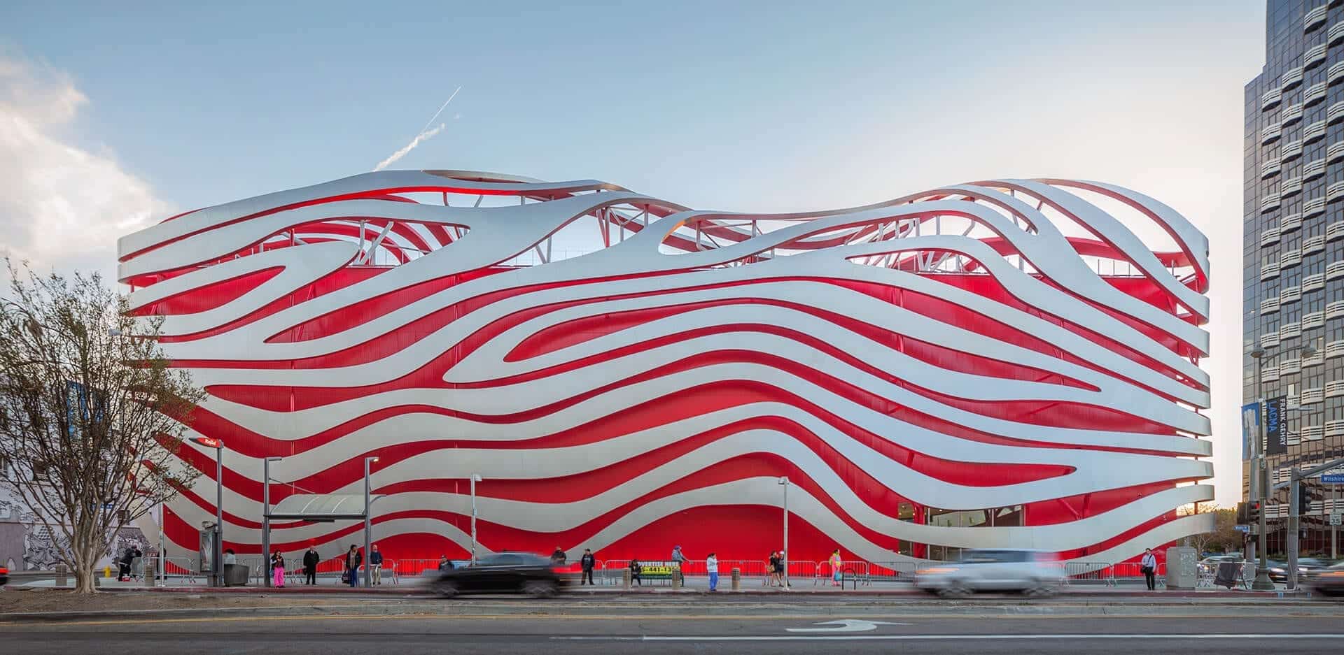 Architectural ribbons clad in Angel Hair stainless steel wrap around the Peterson Automotive Museum.
