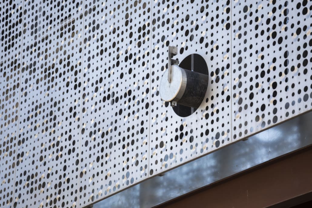 THE WAIEA FACADE'S PERFORATED PANELS ALSO FEATURED A CUSTOM EMBOSSED BUMP PATTERN.