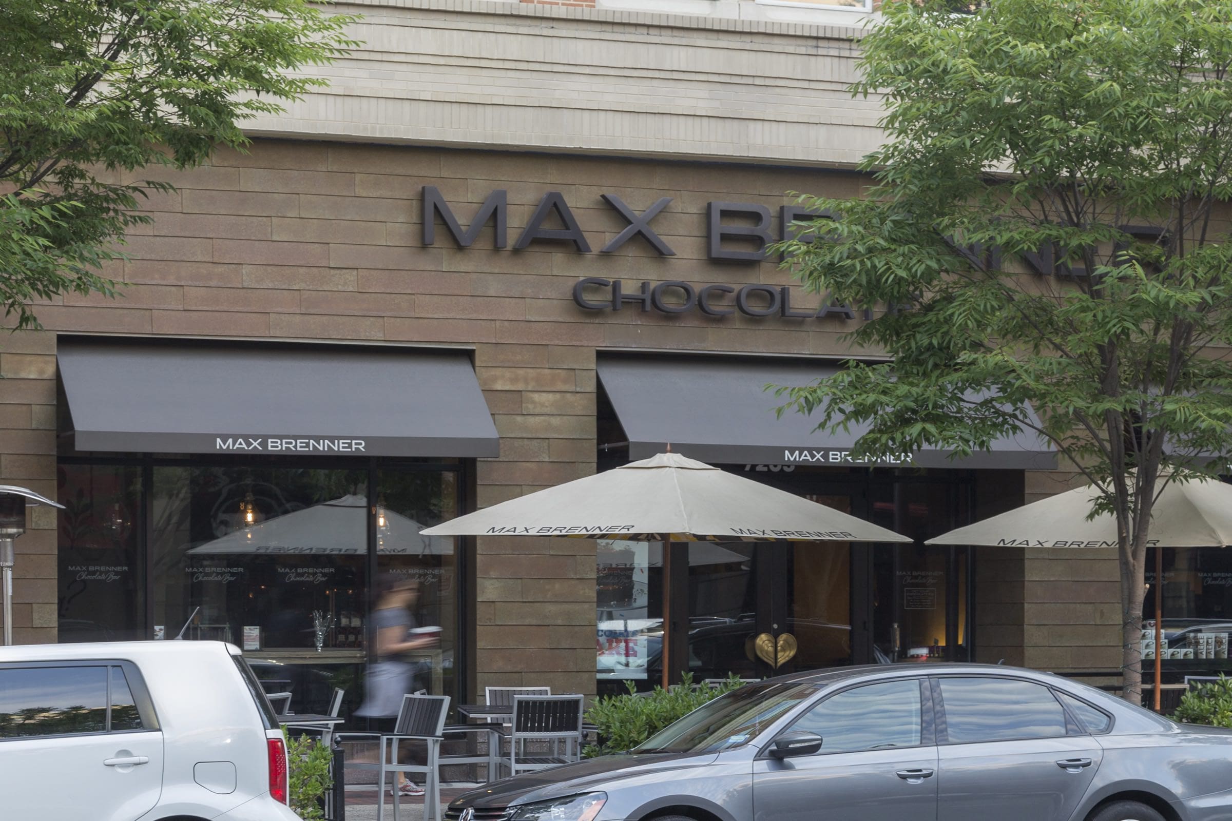 Chocolate company Max Brenner, clad with shingles of Baroque zinc.