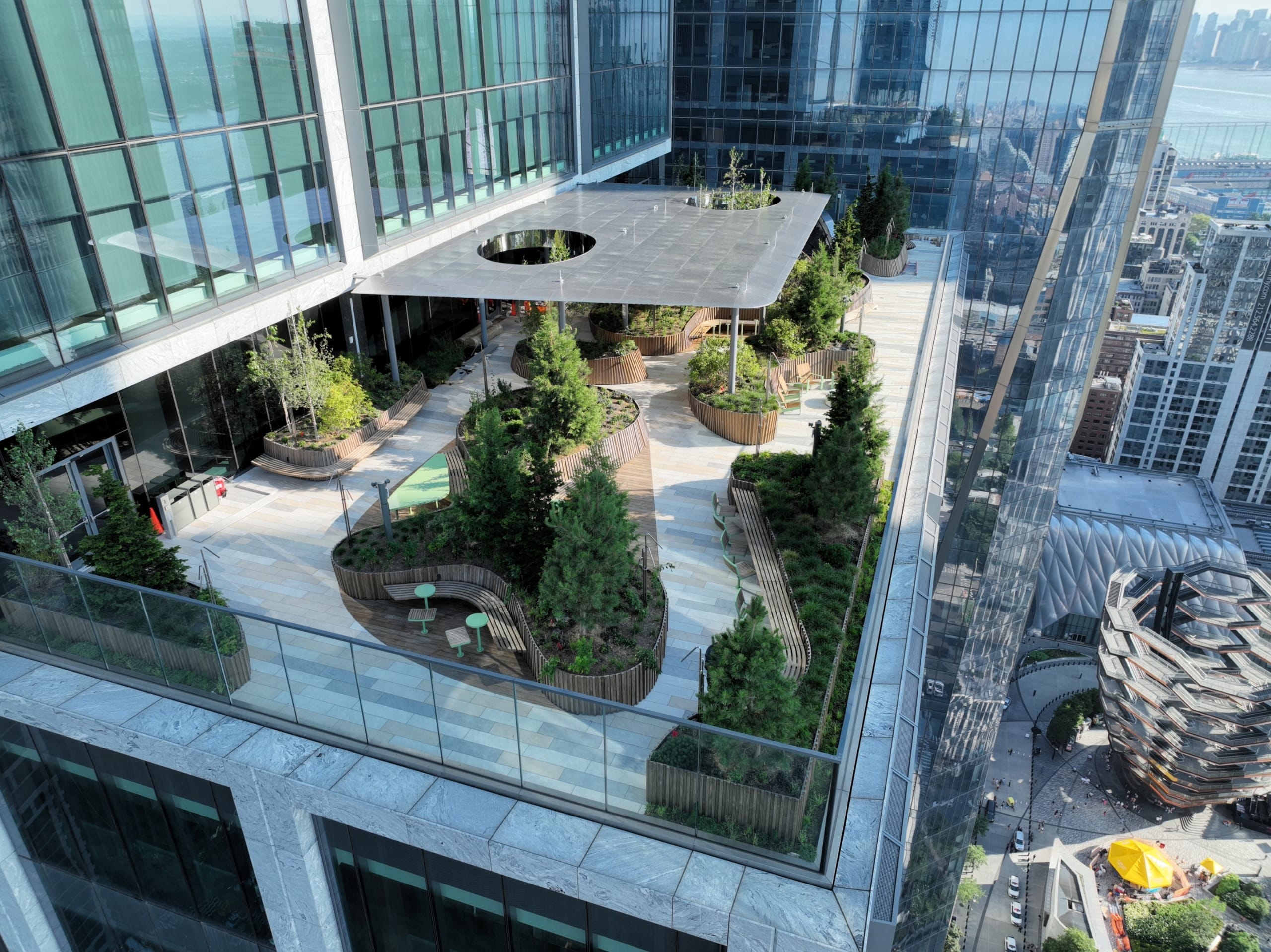 The top of the 50 Hudson Yards terrace canopy features Zahner's Angel Hair stainless steel to mitigate reflectivity.
