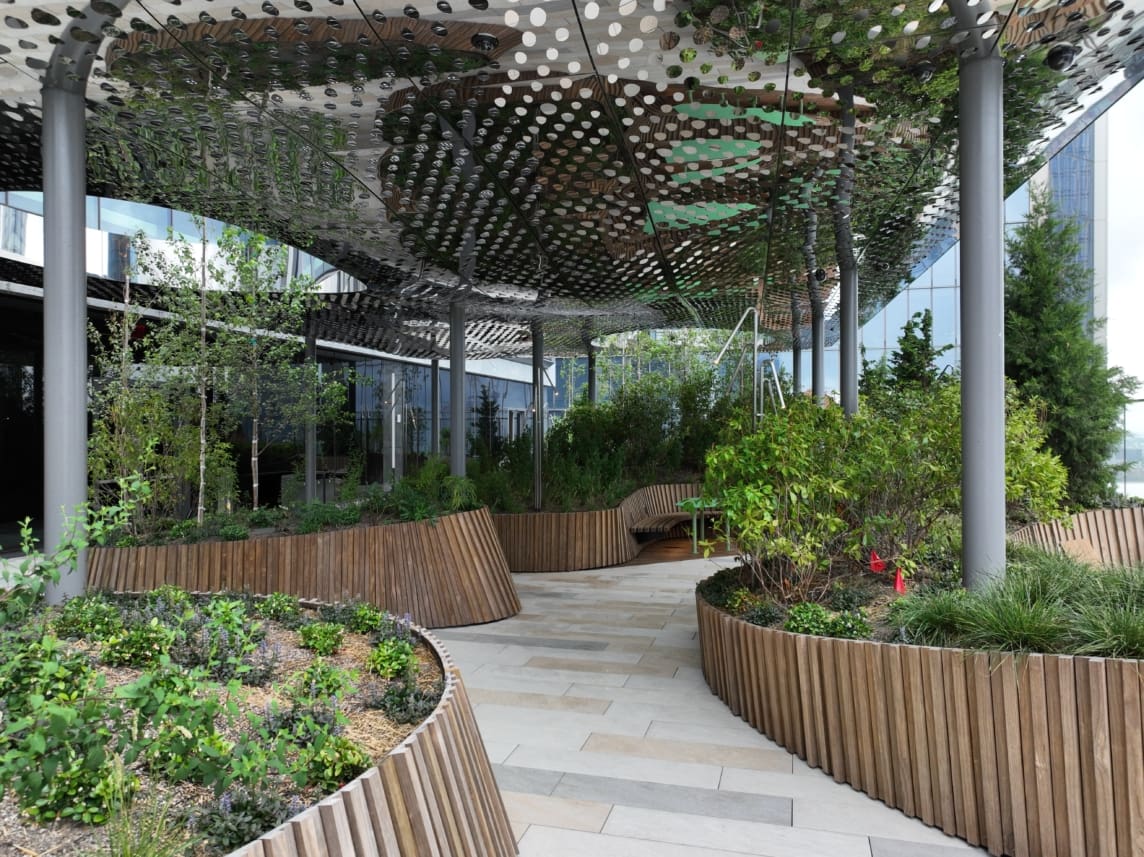 The bottom side of the canopy features perforated mirror polish stainless steel.