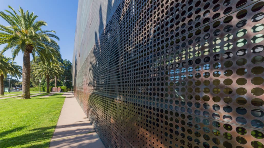 THE DE YOUNG MUSEUM IN CALIFORNIA IS MADE FROM COPPER, AND WILL EVENTUALLY TURN TO A GREEN PATINA.